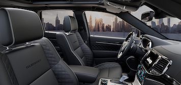 2021 Jeep Grand Cherokee front seating and dashboard